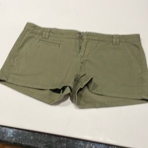 Express green, olive , shorts that are barley worn. Has side pockets.